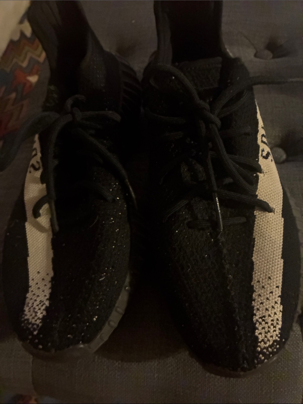 Yeezy Boost Black and Cream Stripe Knit Sneakers